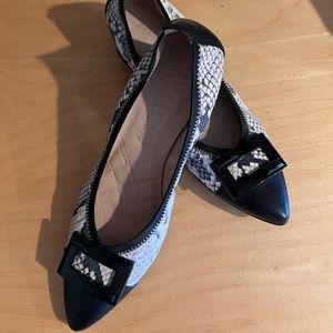 Hispanitas black and white snake spectator pumps